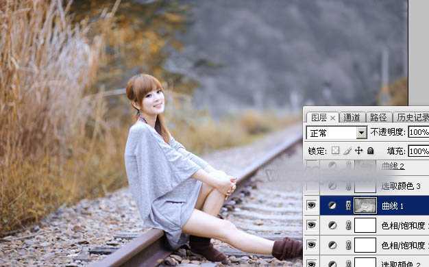 Photoshop为铁轨上的人物加上秋季淡冷色效果教程